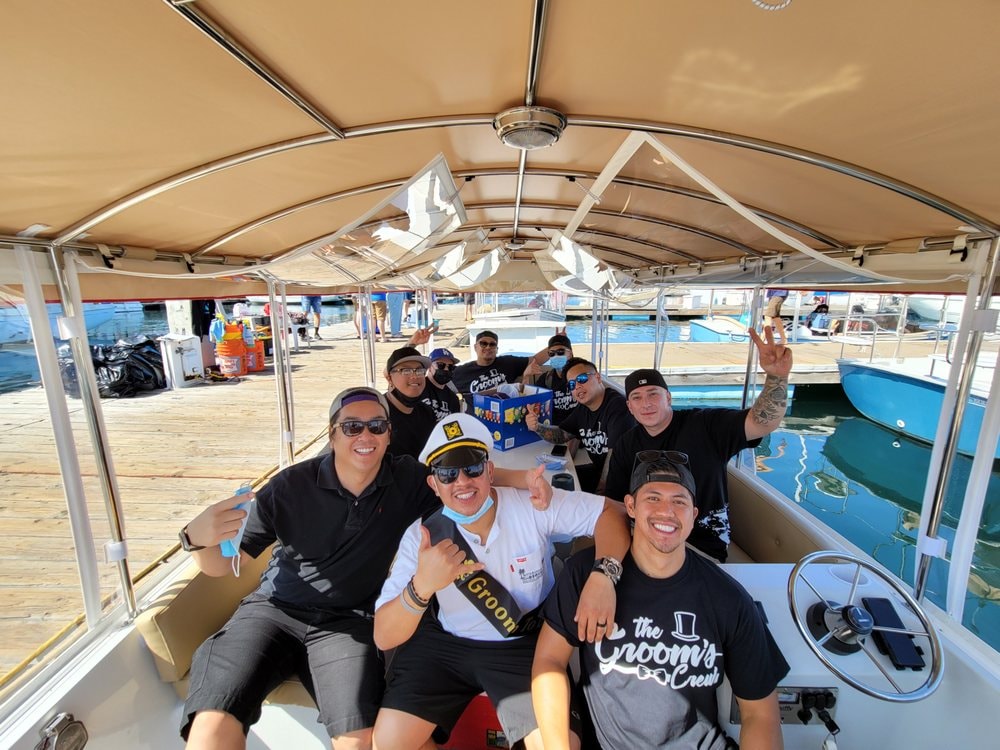 Bachelor party group on a Duffy boat at the dock